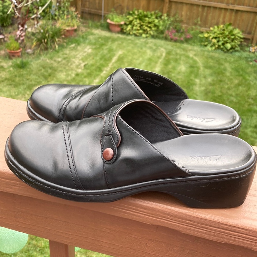 Clarks Black Ivory Mules. Size 9